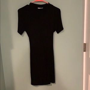 Tight black open back dress